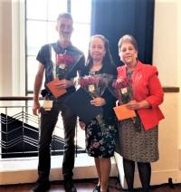 From left to right: Peter Gallagher, Sue Muscatella and Helen Velazquez pose for a group picture.